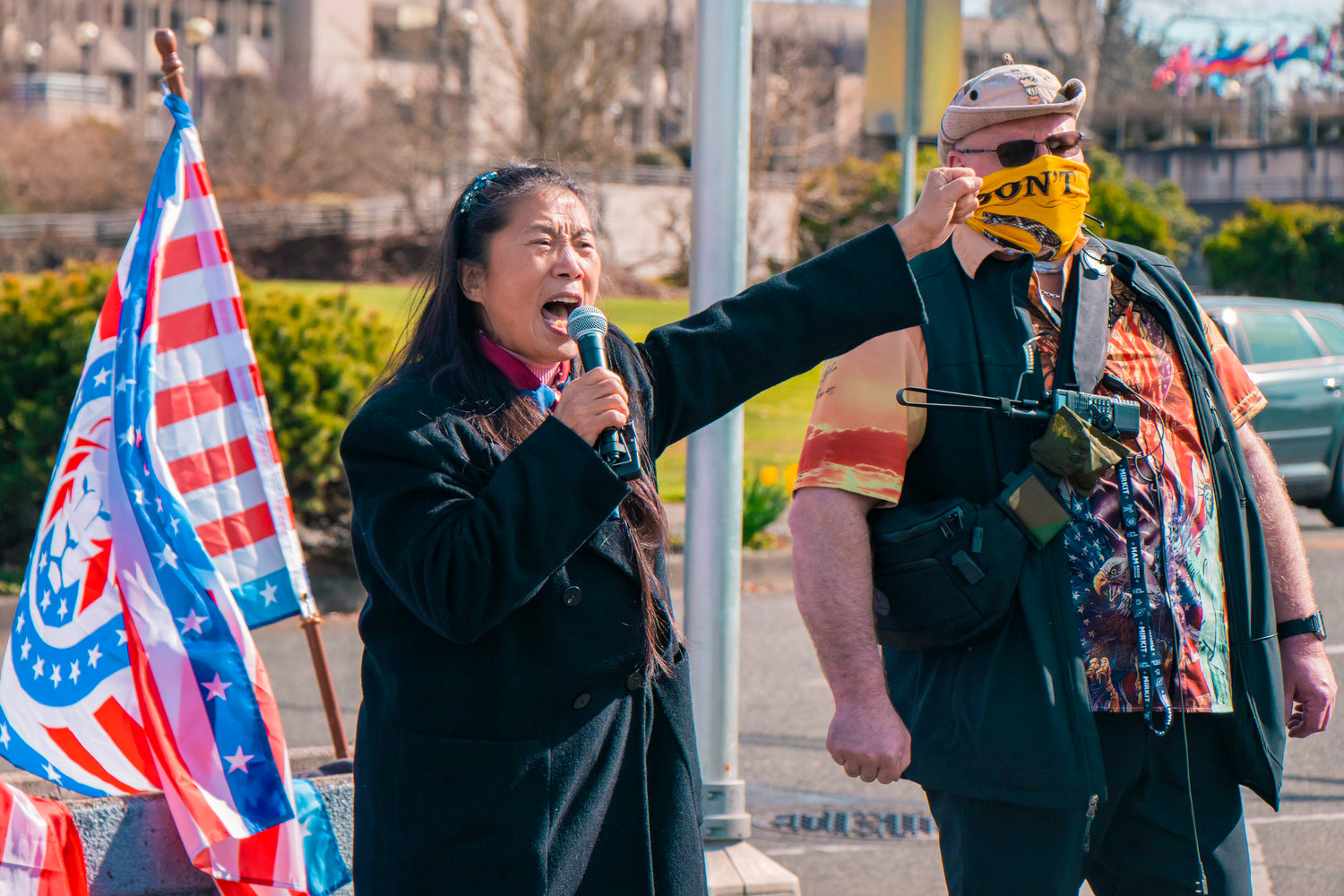 Jane Xiuhong Jin yells ‘Down with the C.C.P,’ during a rally in support of open carry rights near the Washington State Capitol in Olympia on Saturday.