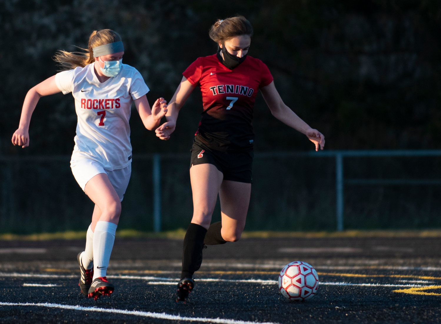 Tenino's Emmar Barr (7) takes possession from Castle Rock's Lori Ogden, left, on Monday.
