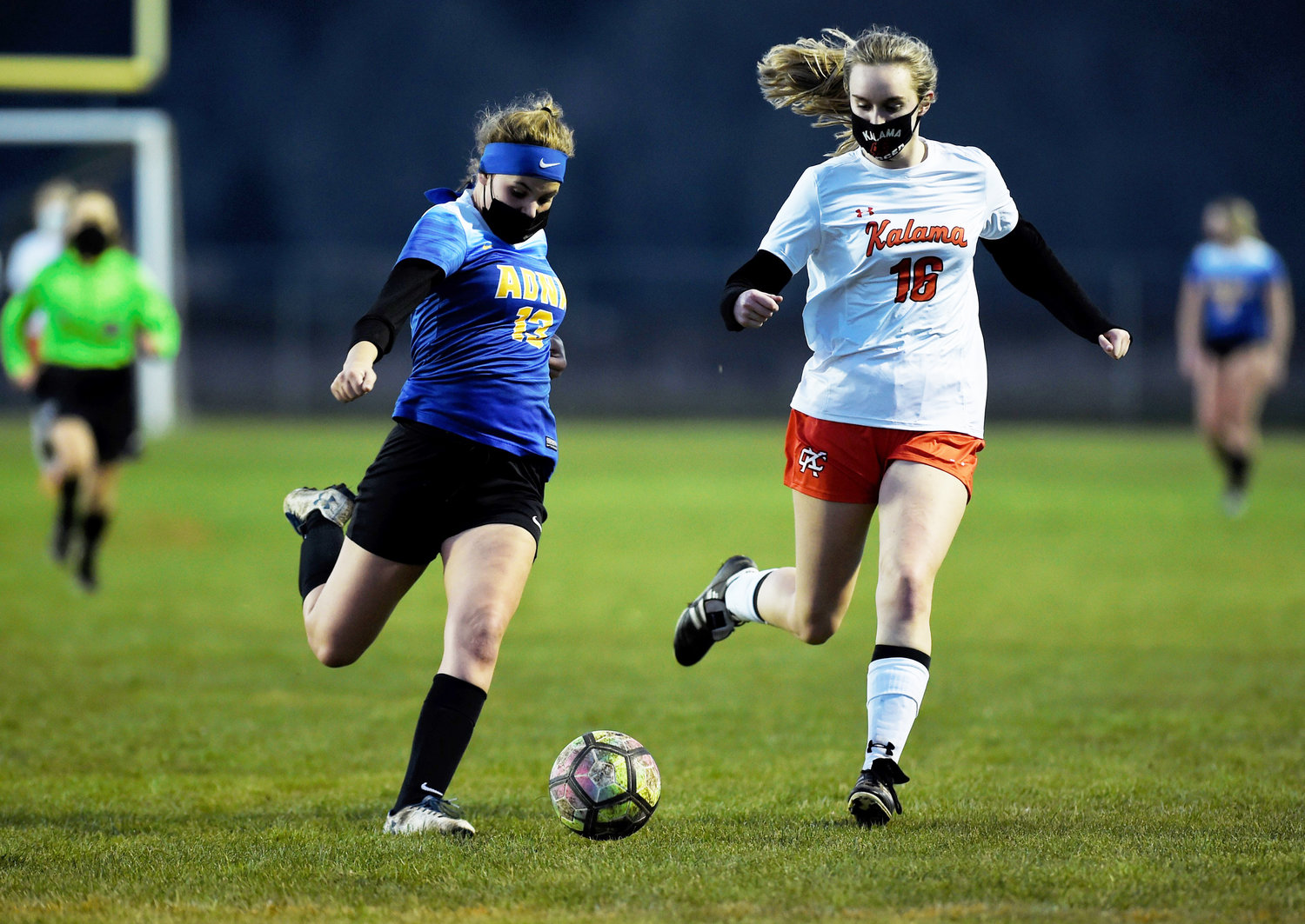 Adna's Gracie Beaulieu (13) goes for a shot against a Kalama defender on Tuesday.