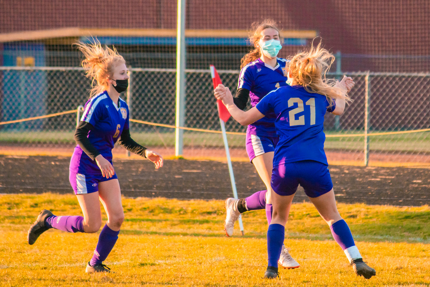 Onalaska athletes celebrate a goal during a game against Ocosta on Tuesday.