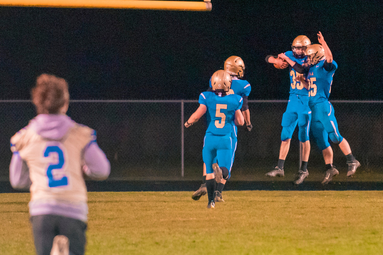 Pirates celebrate a touchdown during a game against PWV in Adna on Wednesday.