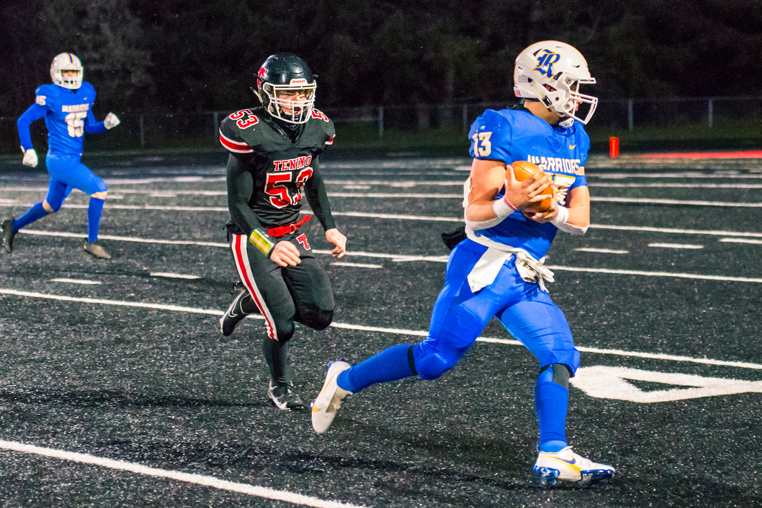 Rochester's Eddie Burkhardt Jr. (13) makes a reception during a game against Tenino Friday night.