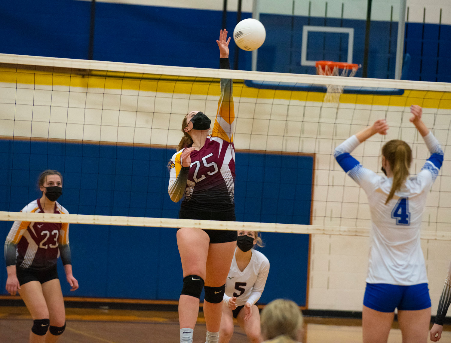 Winlock's Addison Hall spikes the ball against Toutle Lake.