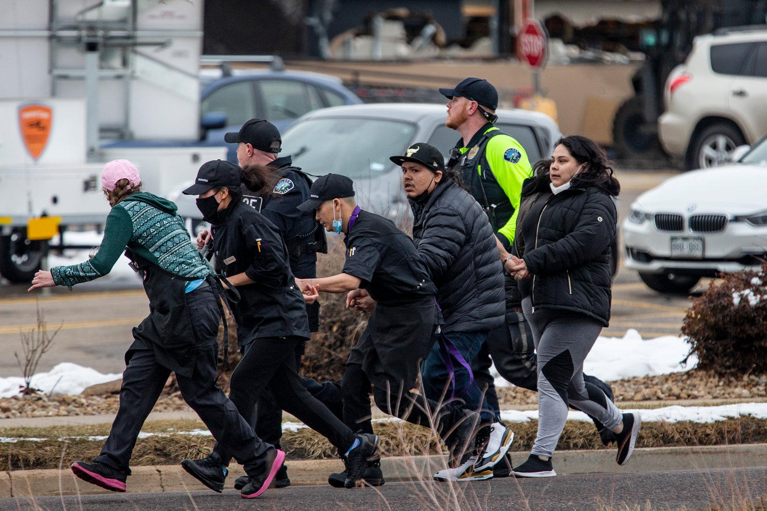 Shoppers are evacuated from a King Soopers grocery store after a gunman opened fire on Monday, March 22, 2021, in Boulder, Colorado. (Chet Strange/Getty Images/TNS)