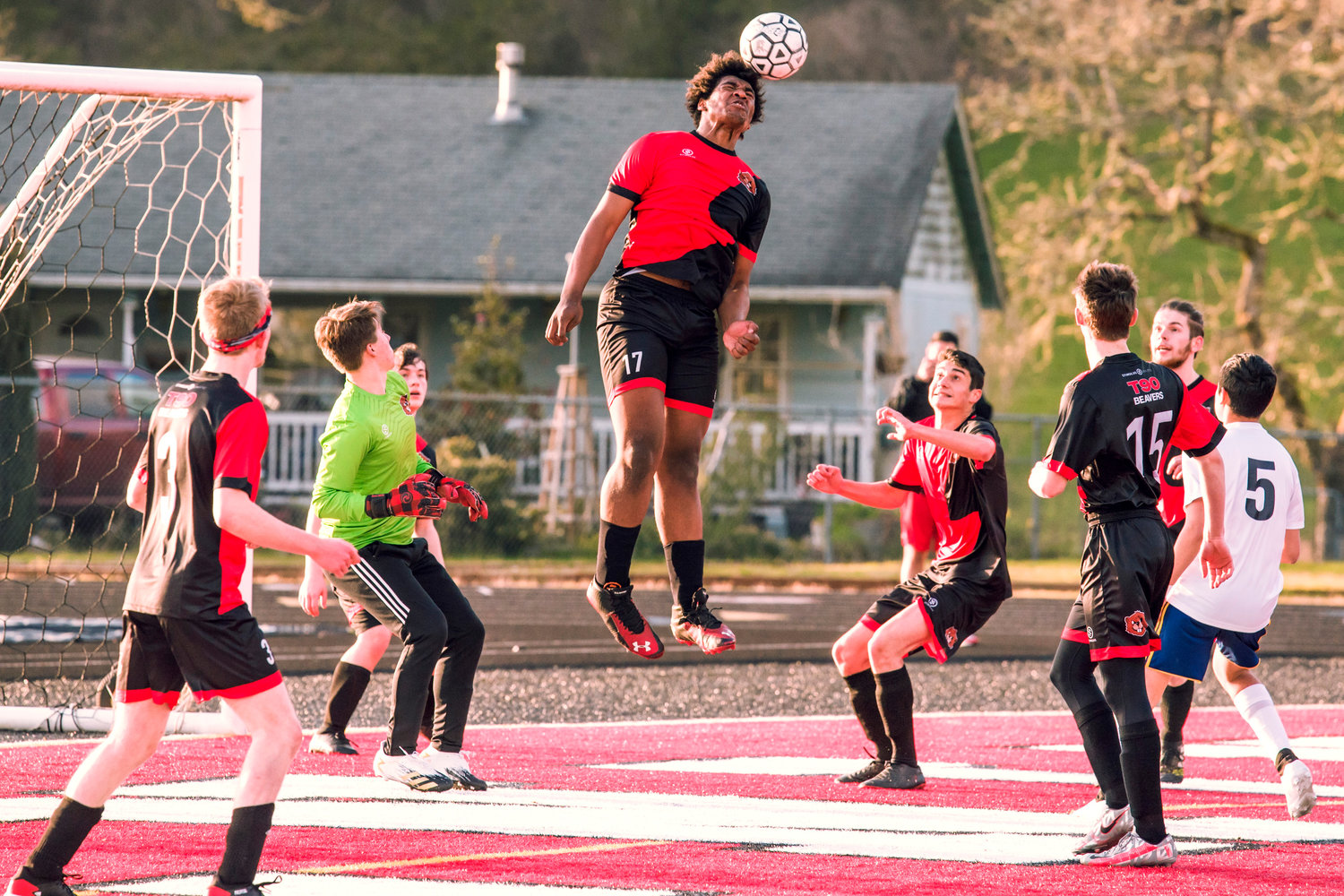 Tenino's Takari Hickle (17) makes a header during a game against Forks on Friday at Beaver Stadium.
