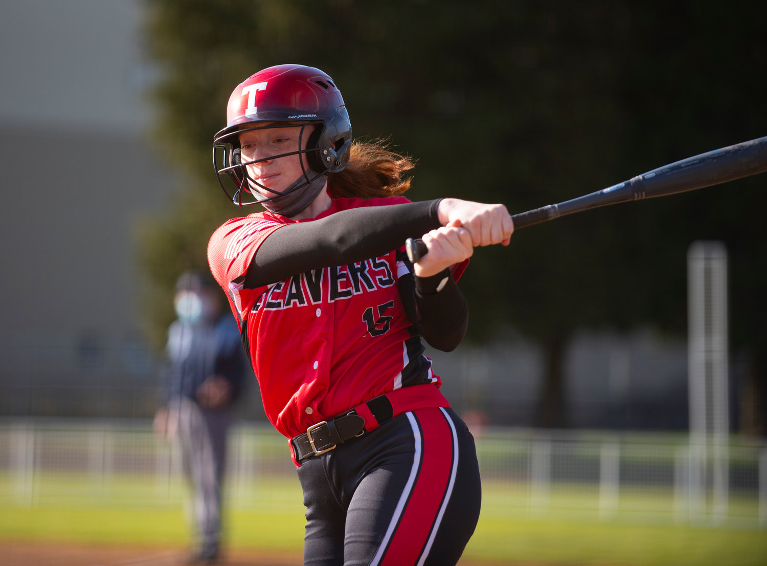 Tenino's Emily Baxter takes a practice swing on Monday against Centralia.