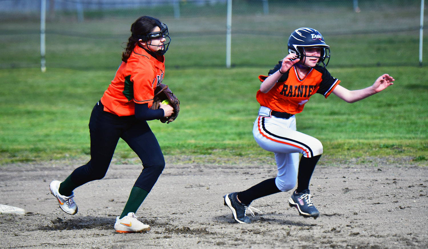 Rainier High School’s Miah Reynolds gets caught in a rundown at second base  during the softball game against Morton-White Pass High School on Monday, March 29, in Rainier.