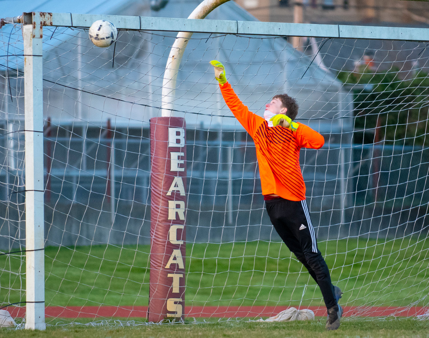 An Aberdeen shot on goal bounces off the cross bar while W.F. West keeper Hayden Sciera leaps for it.