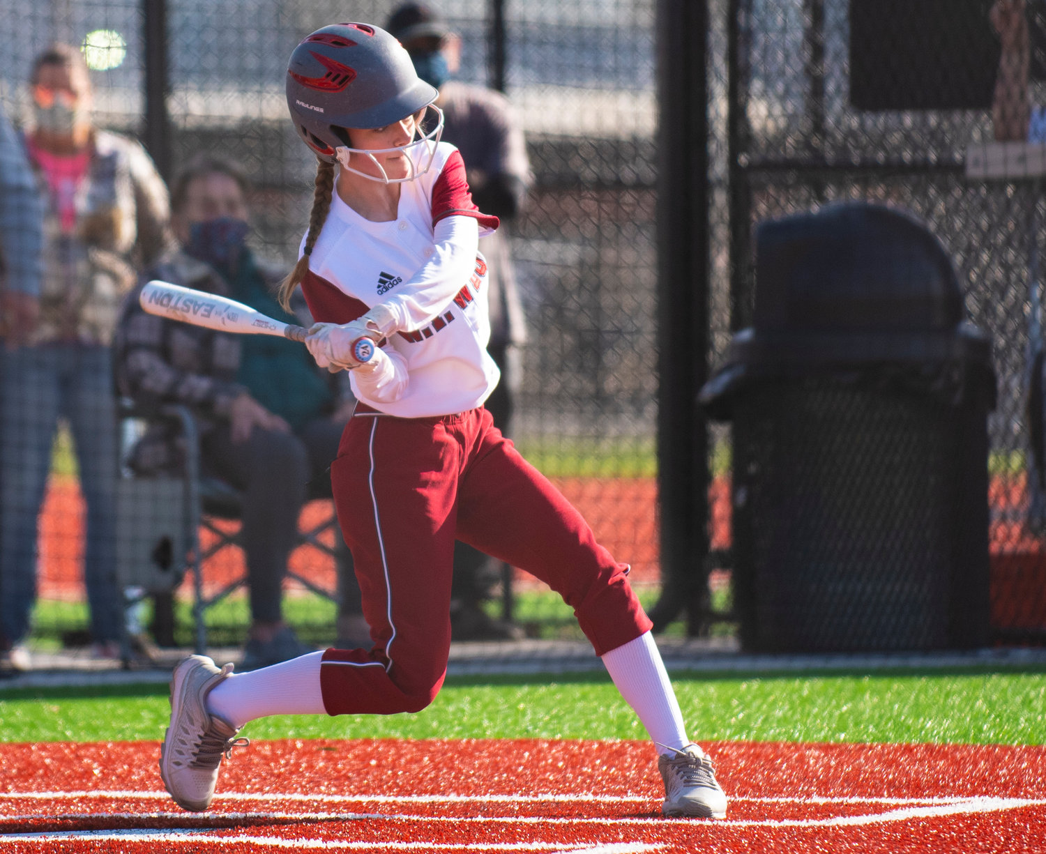 W.F. West sophomore Brielle Etter loads up for a Rochester pitch on Wednesday.