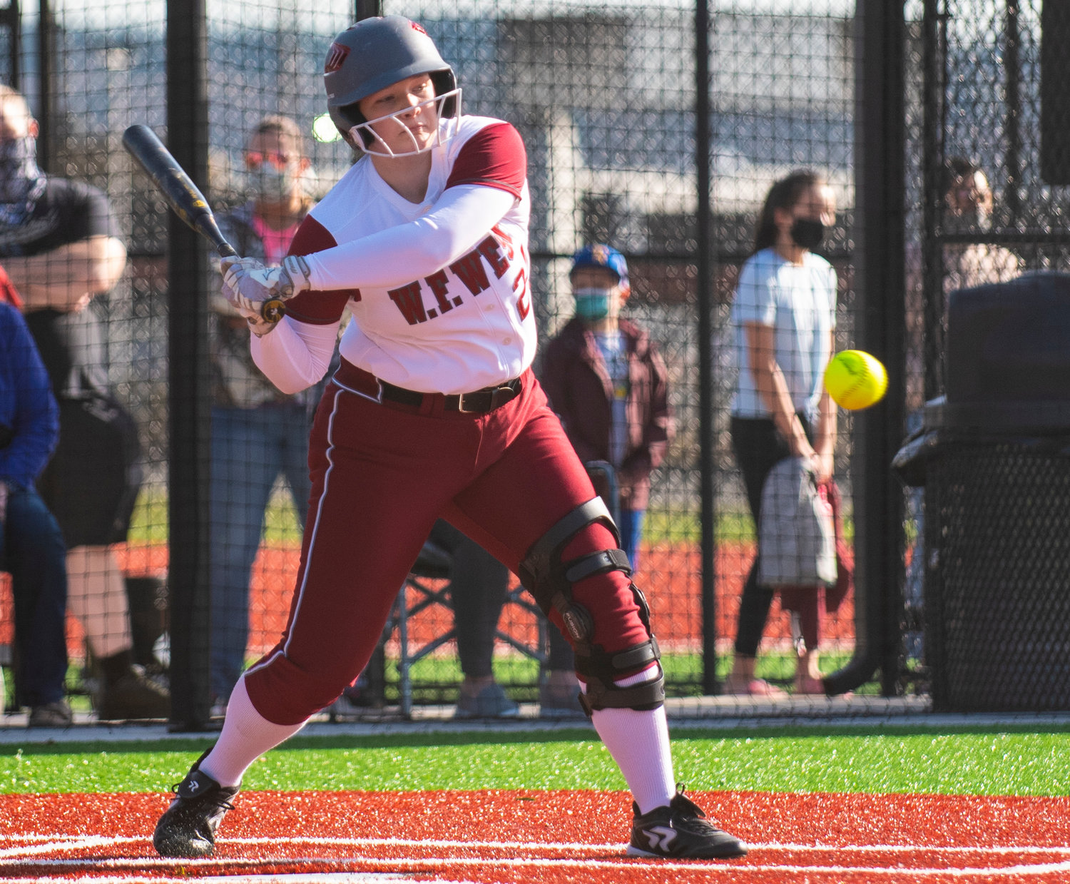 W.F. West sophomore Savannah Hawkins prepares to swing at a Rochester pitch on Wednesday.