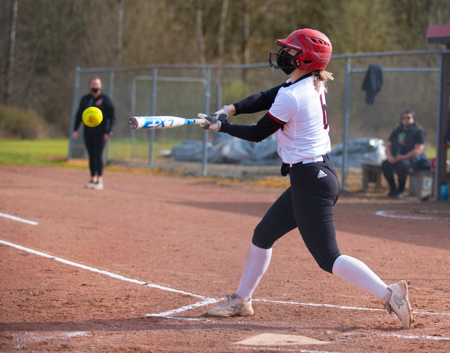 Toledo leadoff hitter Brynn Williams lines up a Wahkiakum pitch on Thursday at home.