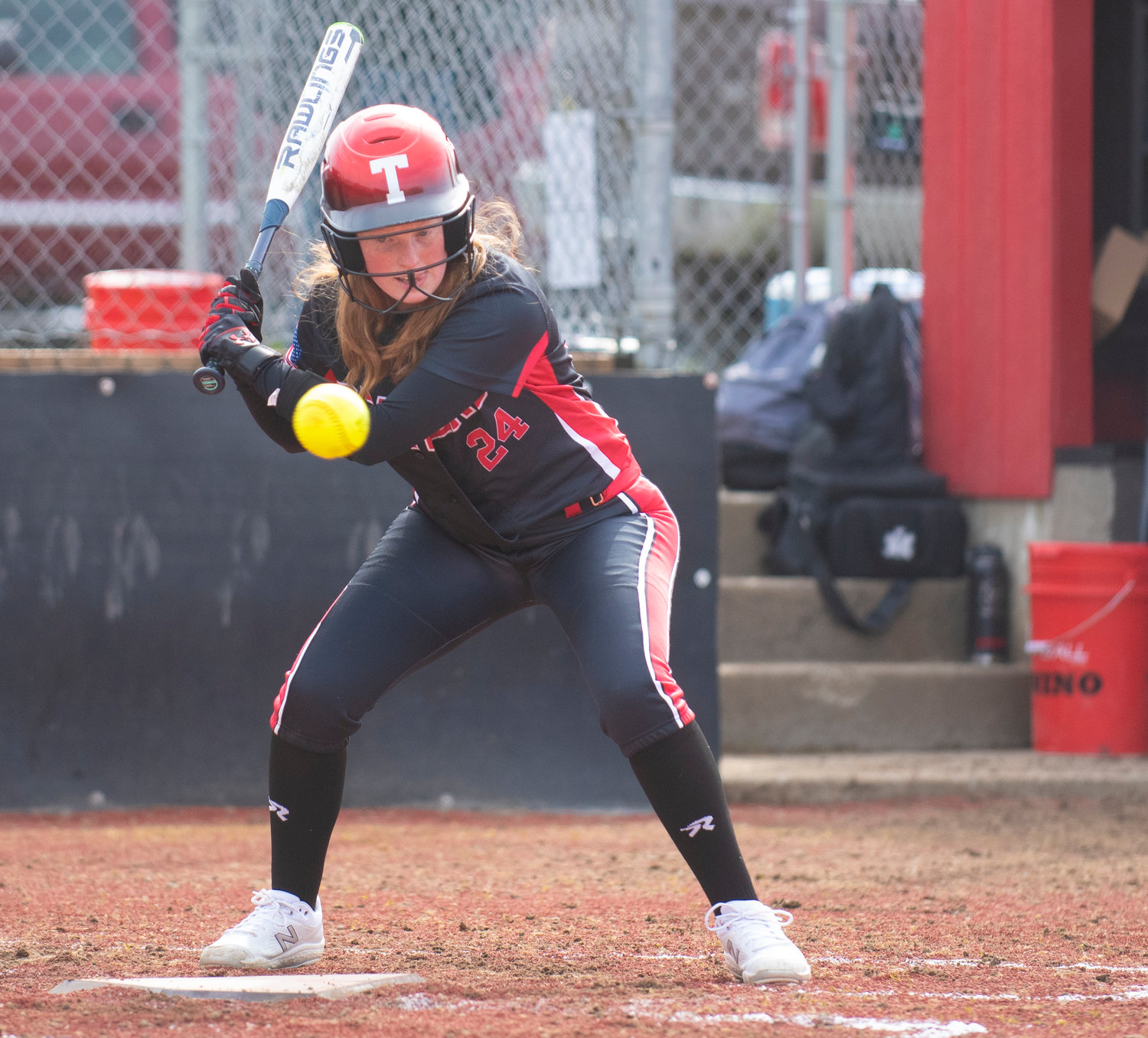 Tenino leadoff hitter and center fielder Abby Severse watches a ball go by on Friday.