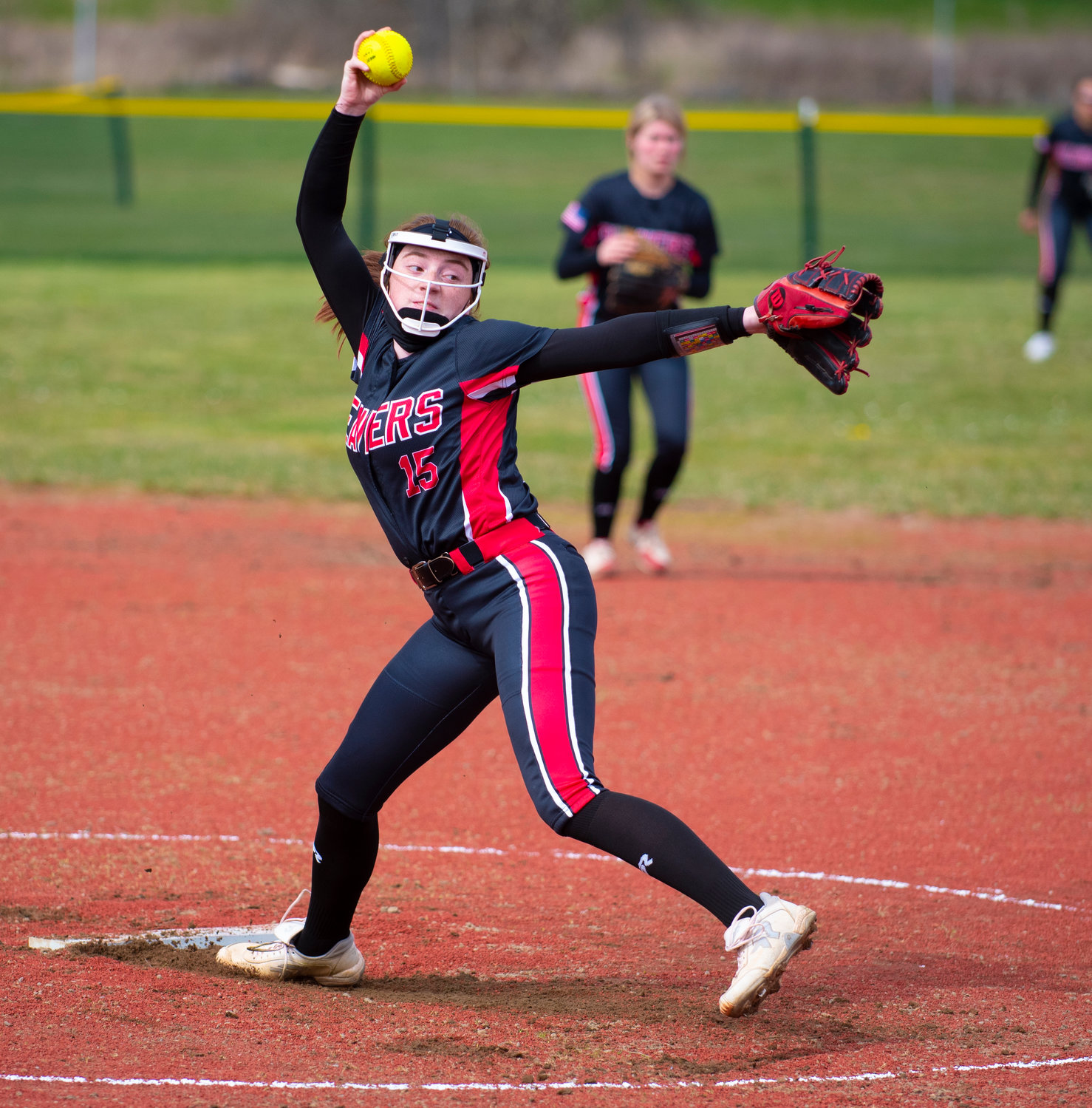 Tenino pitcher Emily Baxter winds up for a pitch to Montesano on Friday.