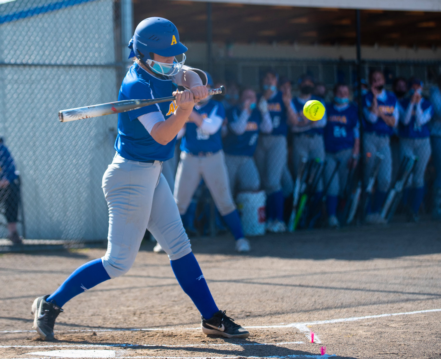 Adna's Haley Rainey loads up to swing at a Toledo pitch on Monday