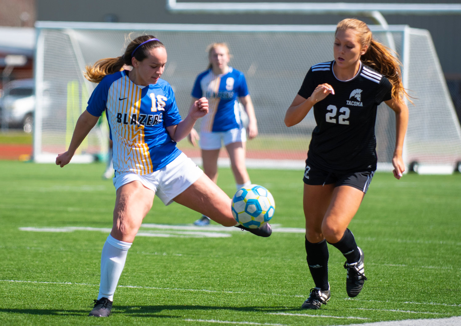 FILE PHOTO - Centralia College sophomore Alexis Thompson (16) boots the bal against a Tacoma forward on Tuesday at Tiger Stadium.