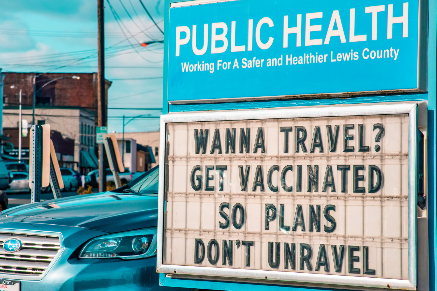FILE PHOTO — A letter board in front of the Lewis County Public Health building urges travelers to get vaccinated last year.