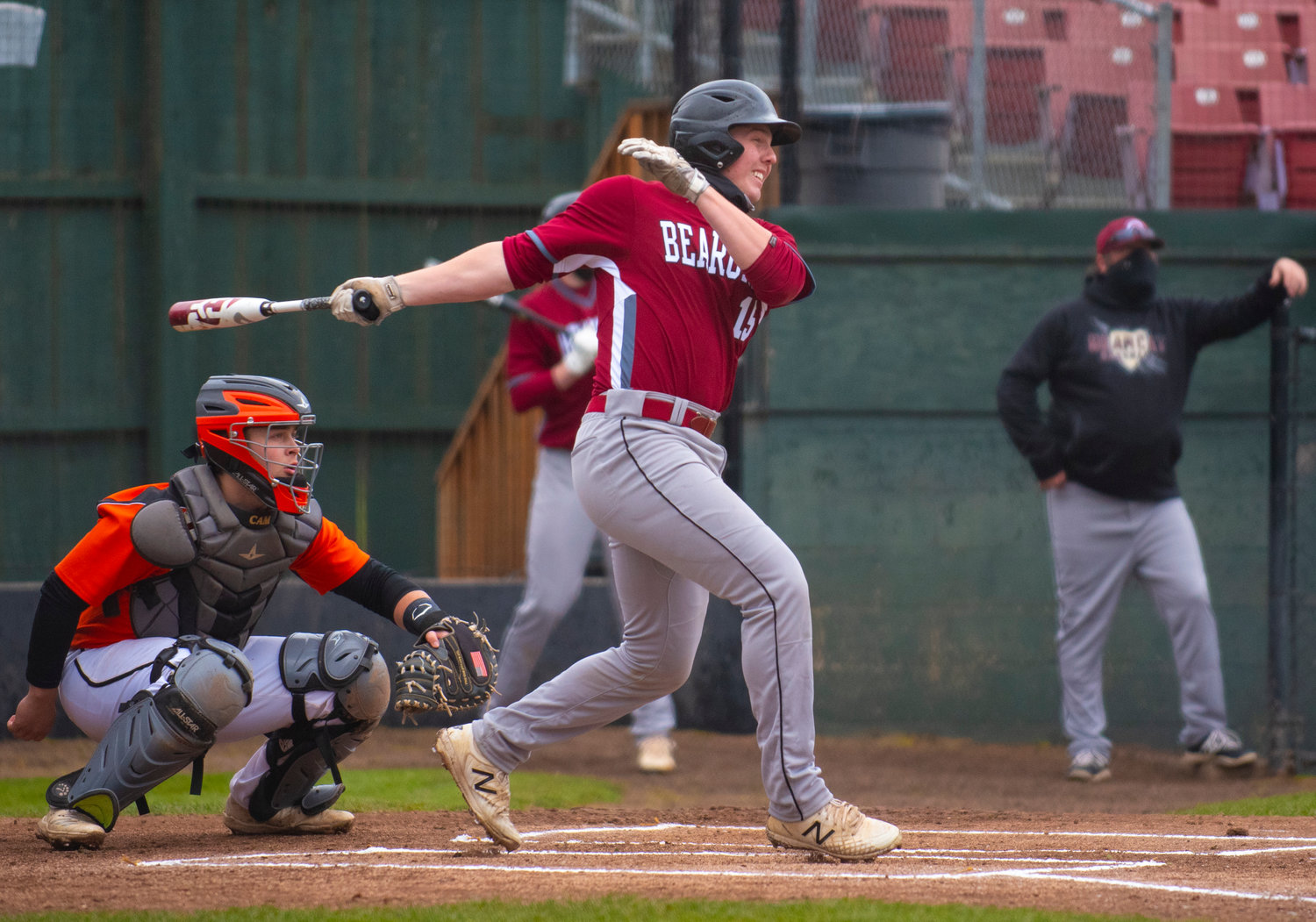 W.F. West catcher Drew Reynolds (15) sends a pitch to the outfield on Friday.