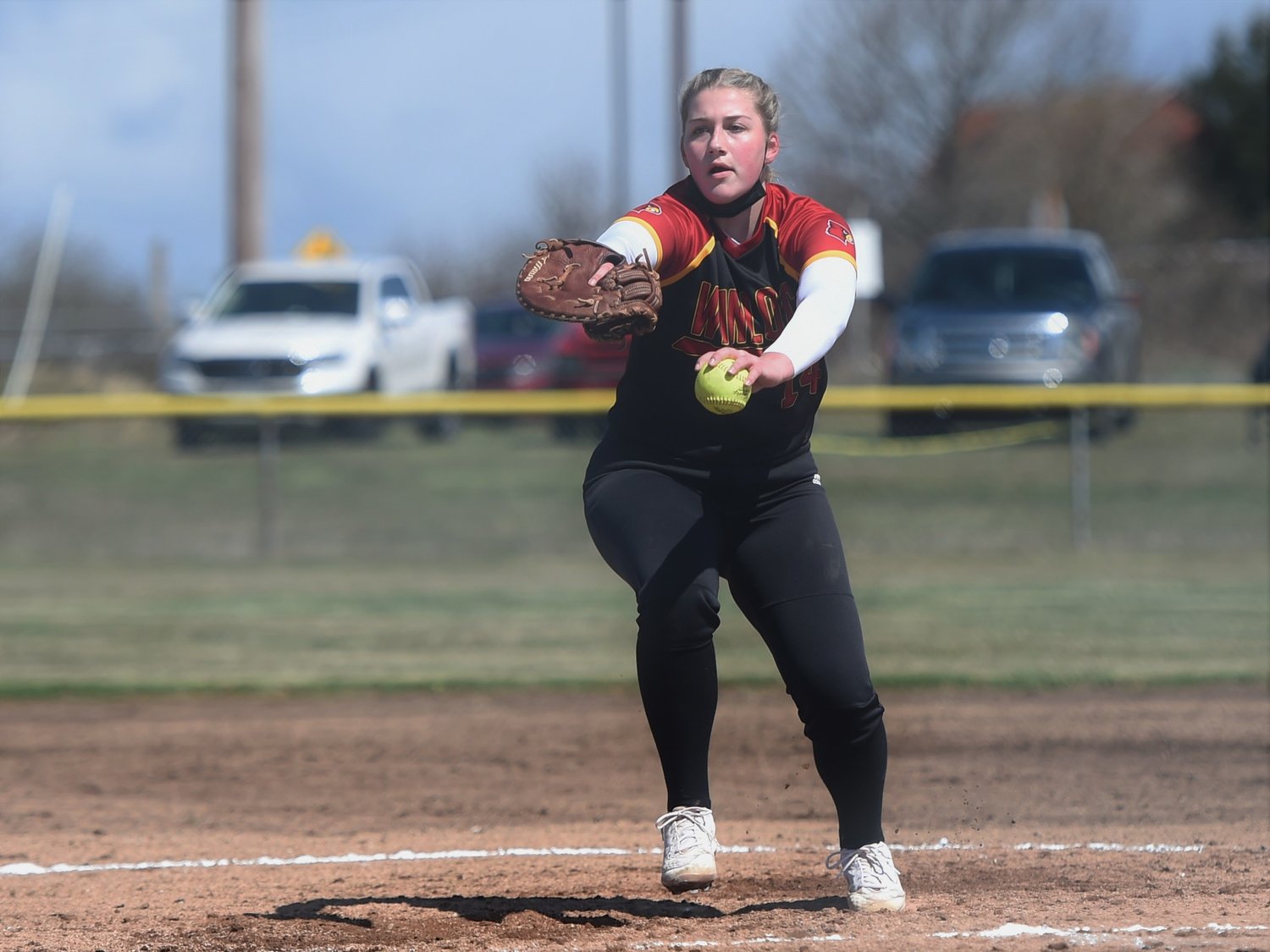 Winlock junior Addison Hall delivers a pitch to Ilwaco at home on Saturday.