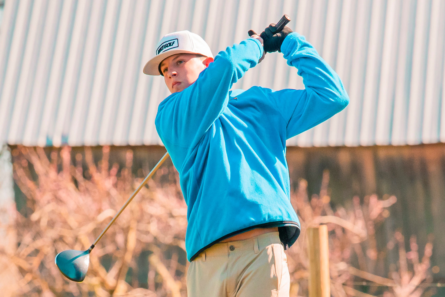 FILE PHOTO - Adna’s Braeden Salme tees off and watches his shot at Riverside Golf Course in Chehalis on Monday.