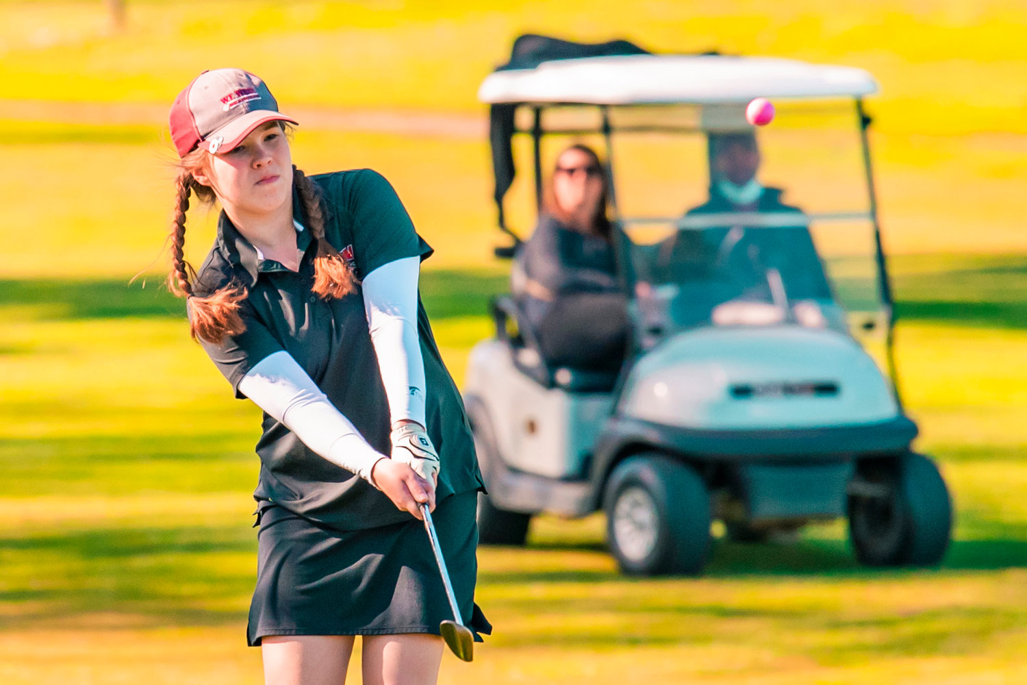 W.F. West’s Makenna Klovdahl makes contact at Riverside Golf Course on Monday in Chehalis.