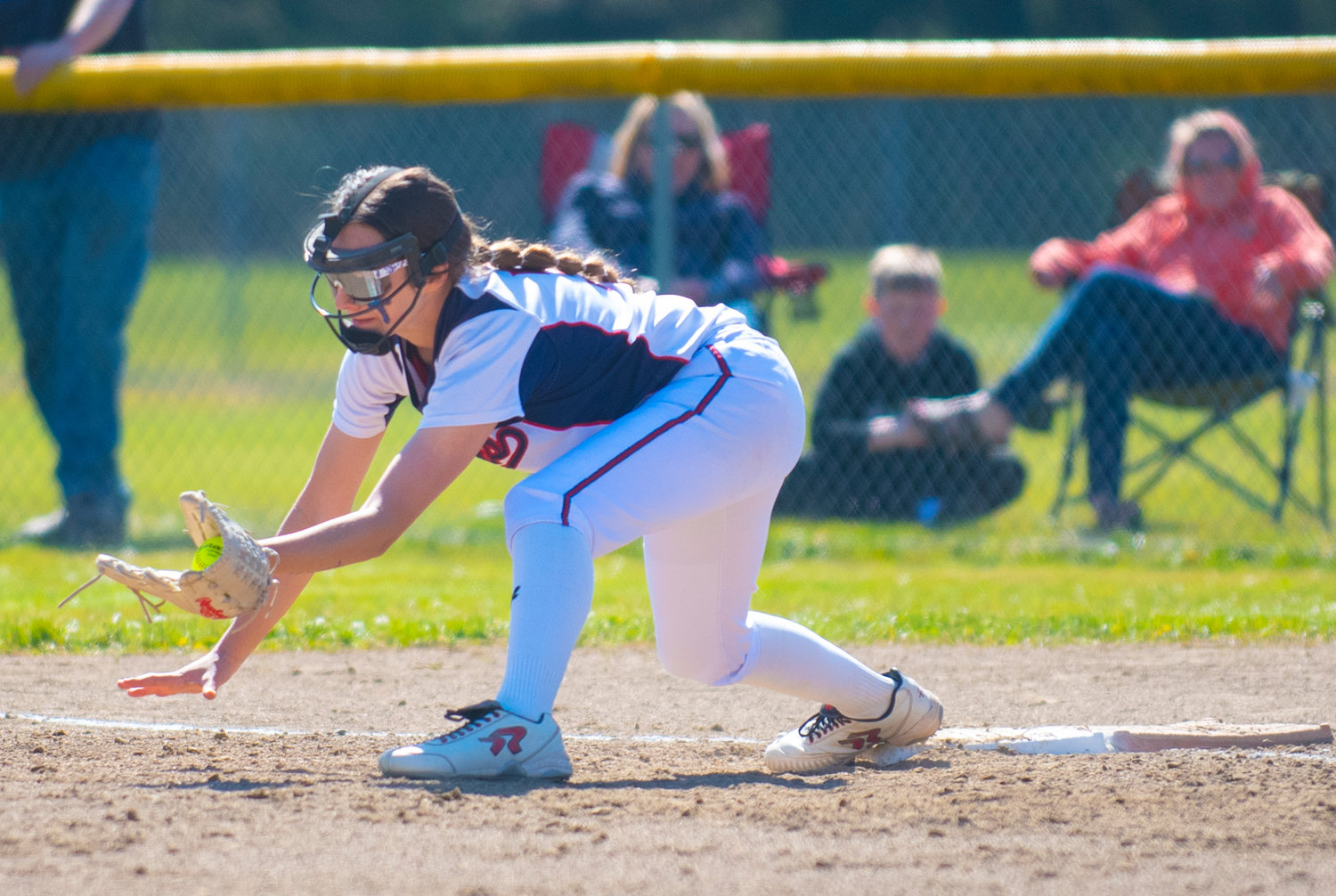 PWV first baseman Dani Shannon stretches to make an out for the Titans on Tuesday.