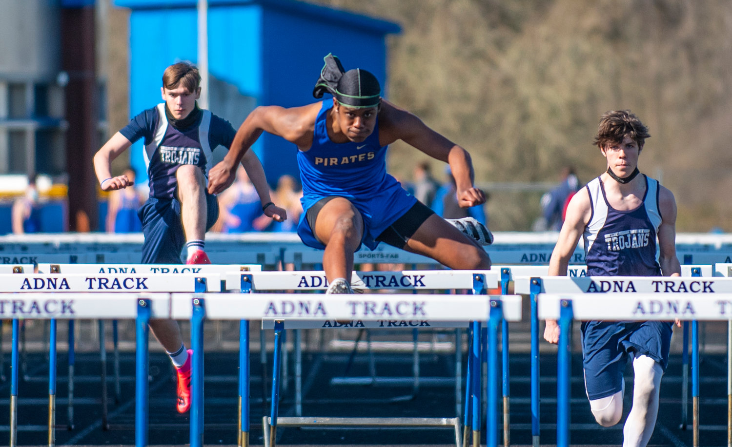 Adna's Willis Ames, center, captured the boys 110-meter high hurdles on Tuesday in Adna.