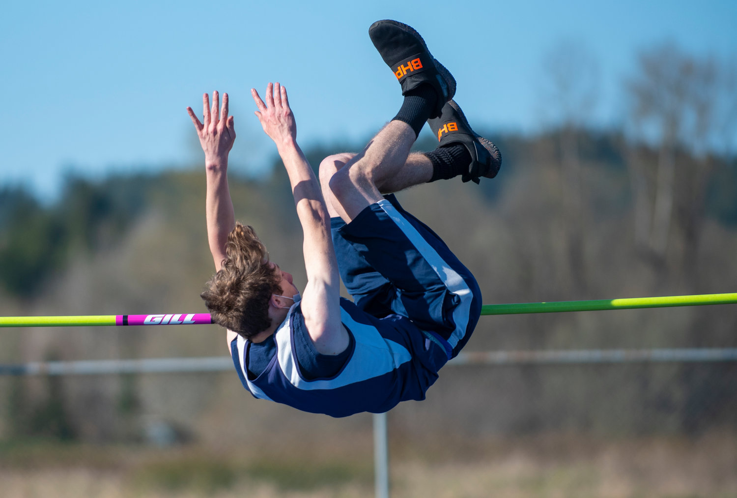 Pe Ell sophomore Jesse Zard placed second in the boys high jump with a leap of 5-02, which he is shown clearing here.