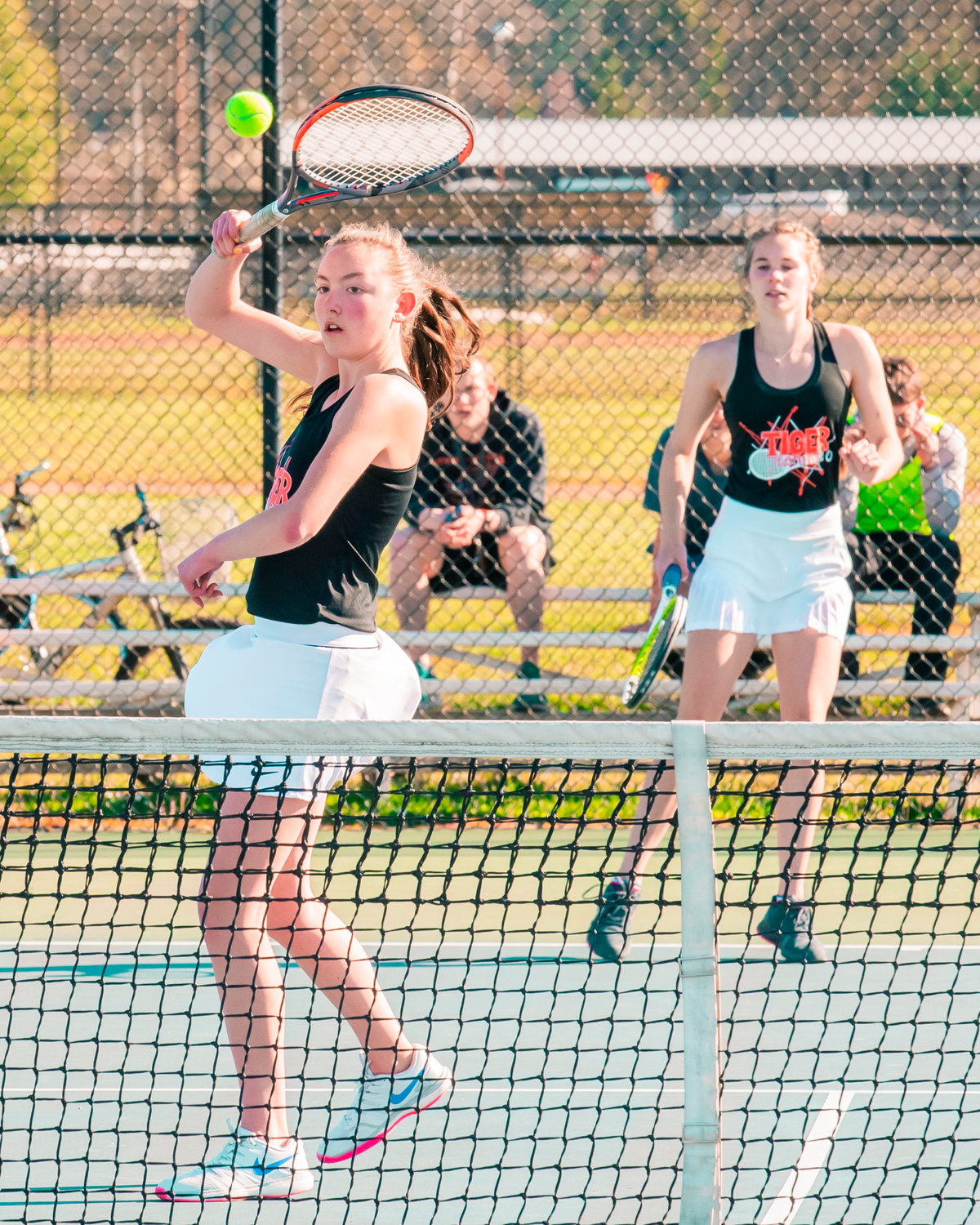 Centralia’s Maya O’Dell returns a ball during a doubles match with Maddie Corwin on Wednesday.