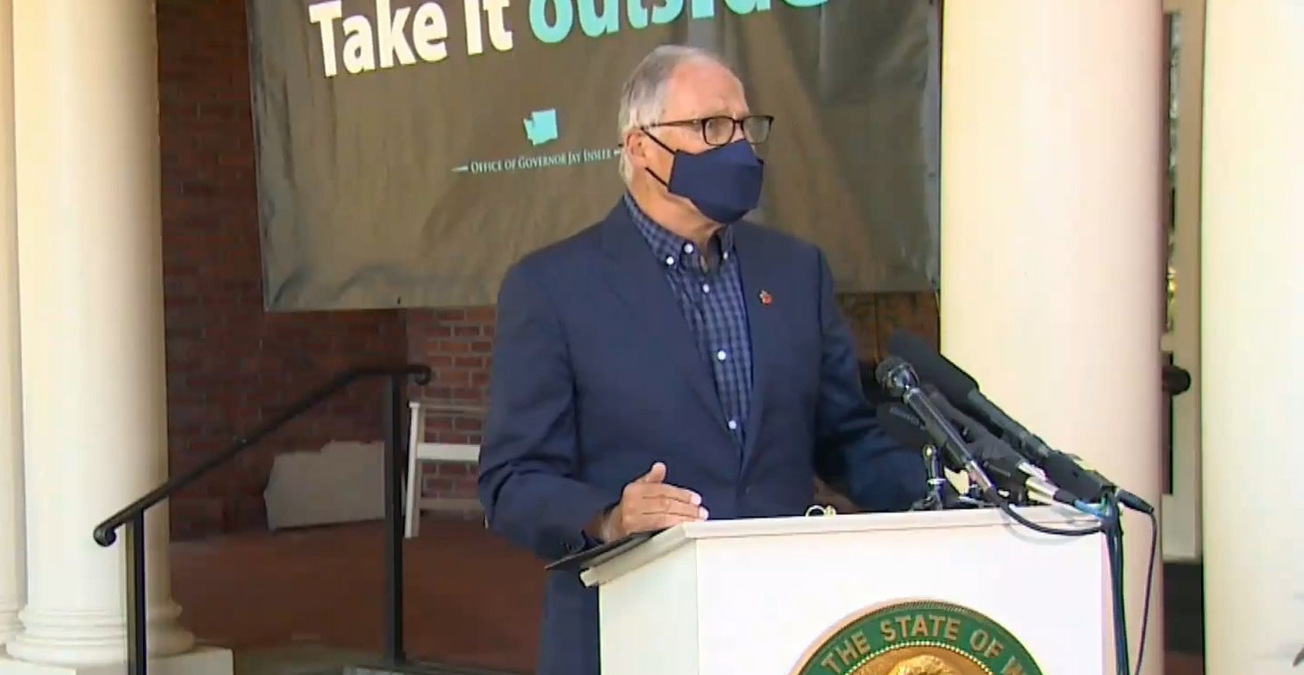 Gov. Jay Inslee hosts a press conference outside of the governor’s mansion Thursday, April 15, to announce the new “take it outside” initiative intended to help stop the spread of COVID-19.