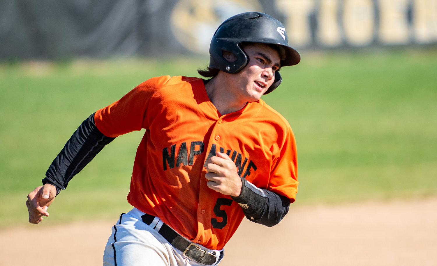 Napavine junior Gavin Parker rounds third base to score a run for the TIigers against Kalama at home on Tuesday.