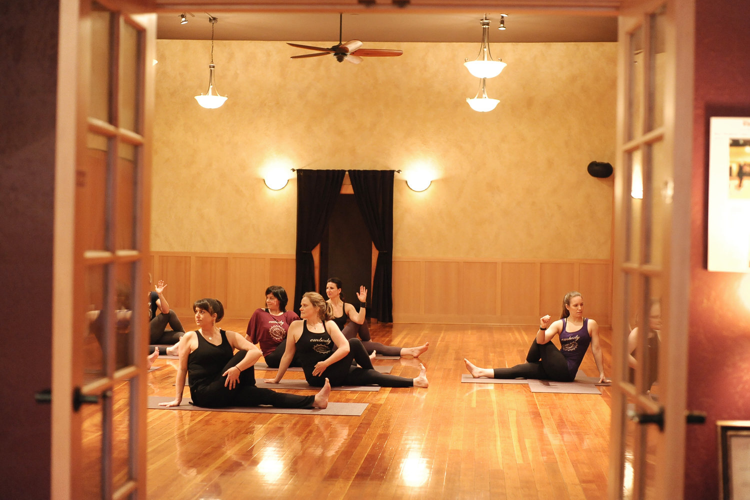 Embody Movement Studio members are seen on mats in this courtesy photo.