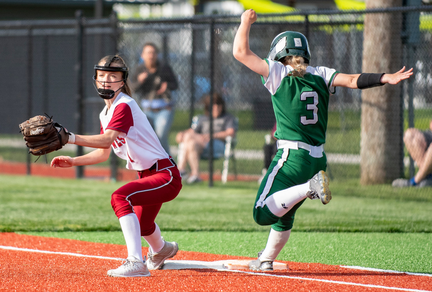 W.F. West second baseman Brielle Etter catches the out at first base.