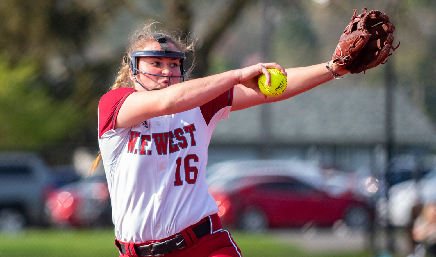 W.F. West acew Kamy Dacus winds up to deliver a pitch to a Tumwater batter on Wednesday.