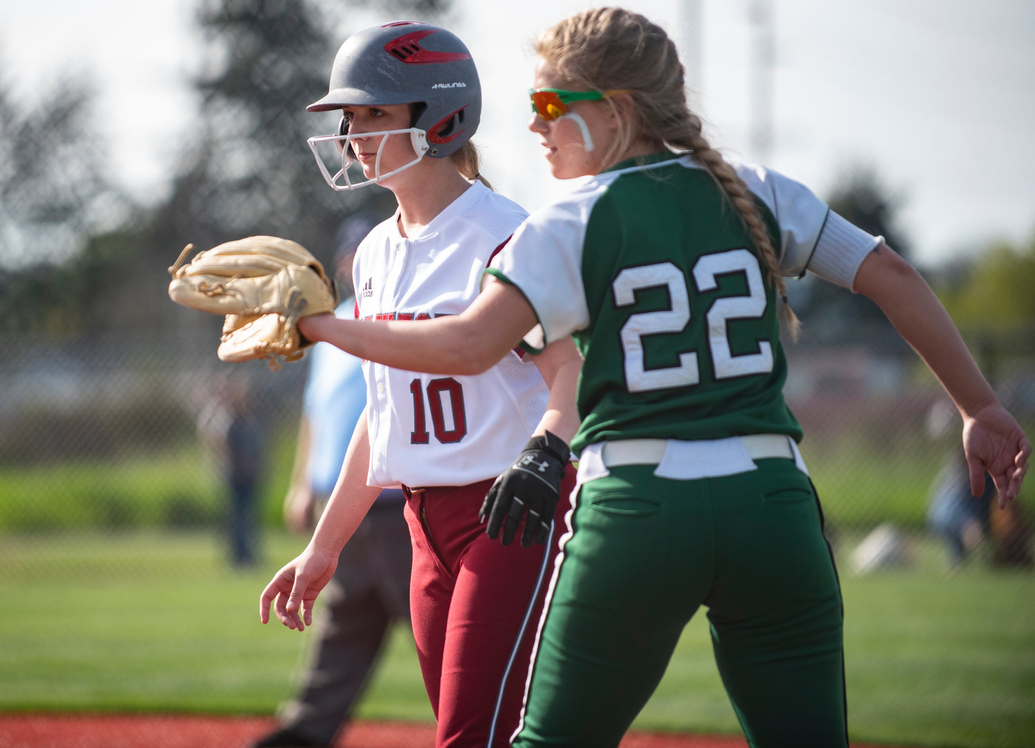 W.F. West's Breanna Crosby watches the Tumwater's catcher while sitting on first base.