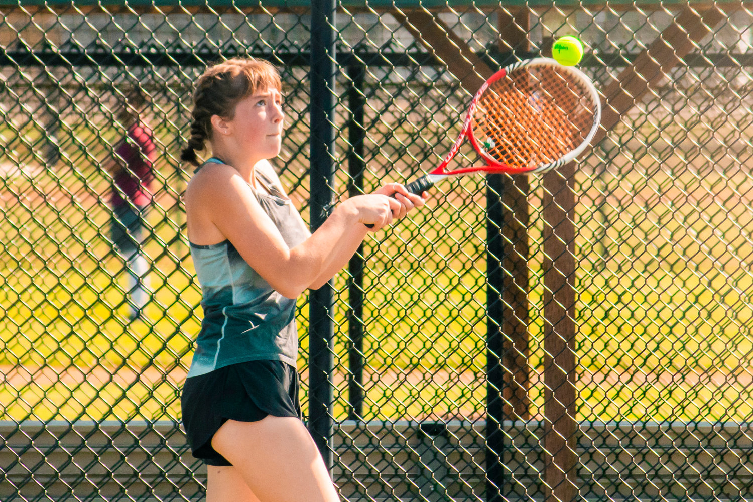 Centralia’s Liza Hopkins returns a ball during a tennis match against Tumwater Wednesday afternoon.