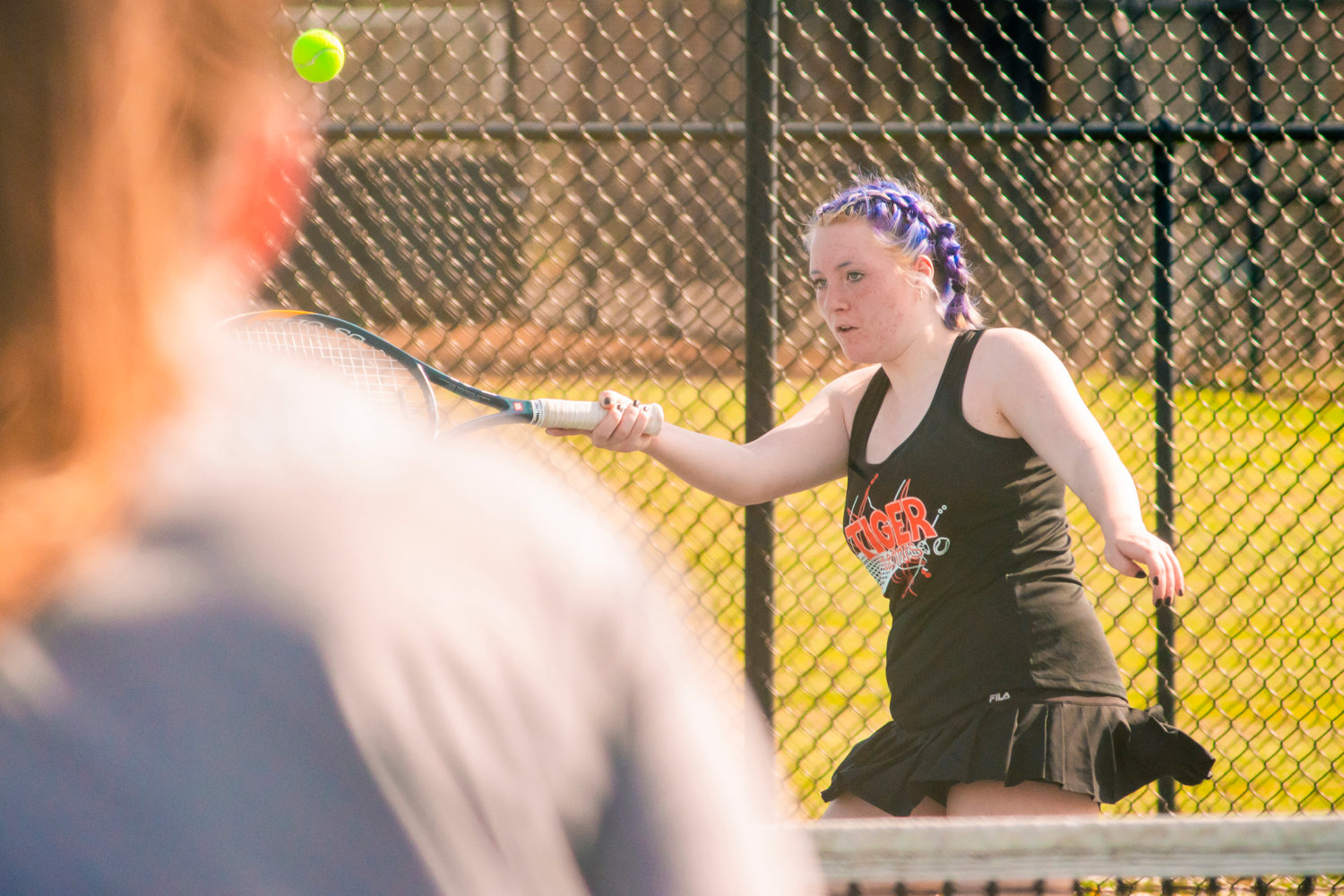 Centralia’s Nora Sas returns a ball during a tennis match against Tumwater Wednesday afternoon.
