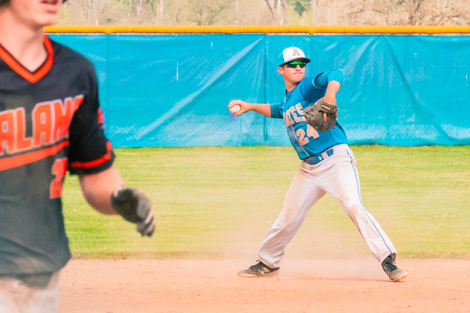 Adna’s Levi Gates (24) makes a throw for an out during a game against Kalama Thursday afternoon.