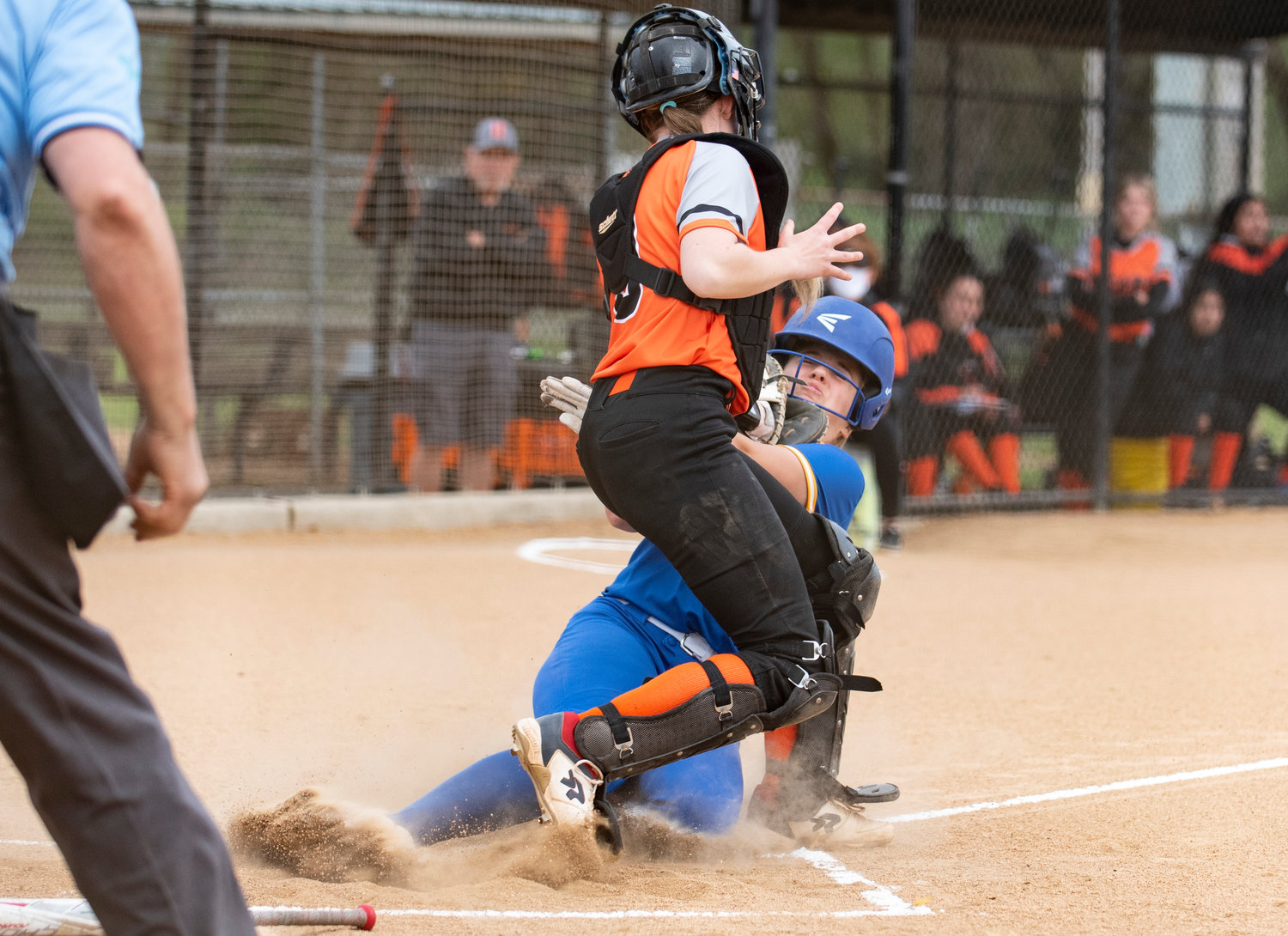 Rochester's Callie Crawford gets tagged out sliding into home plate on Friday by Centralia catcher Courtney Spriggs.