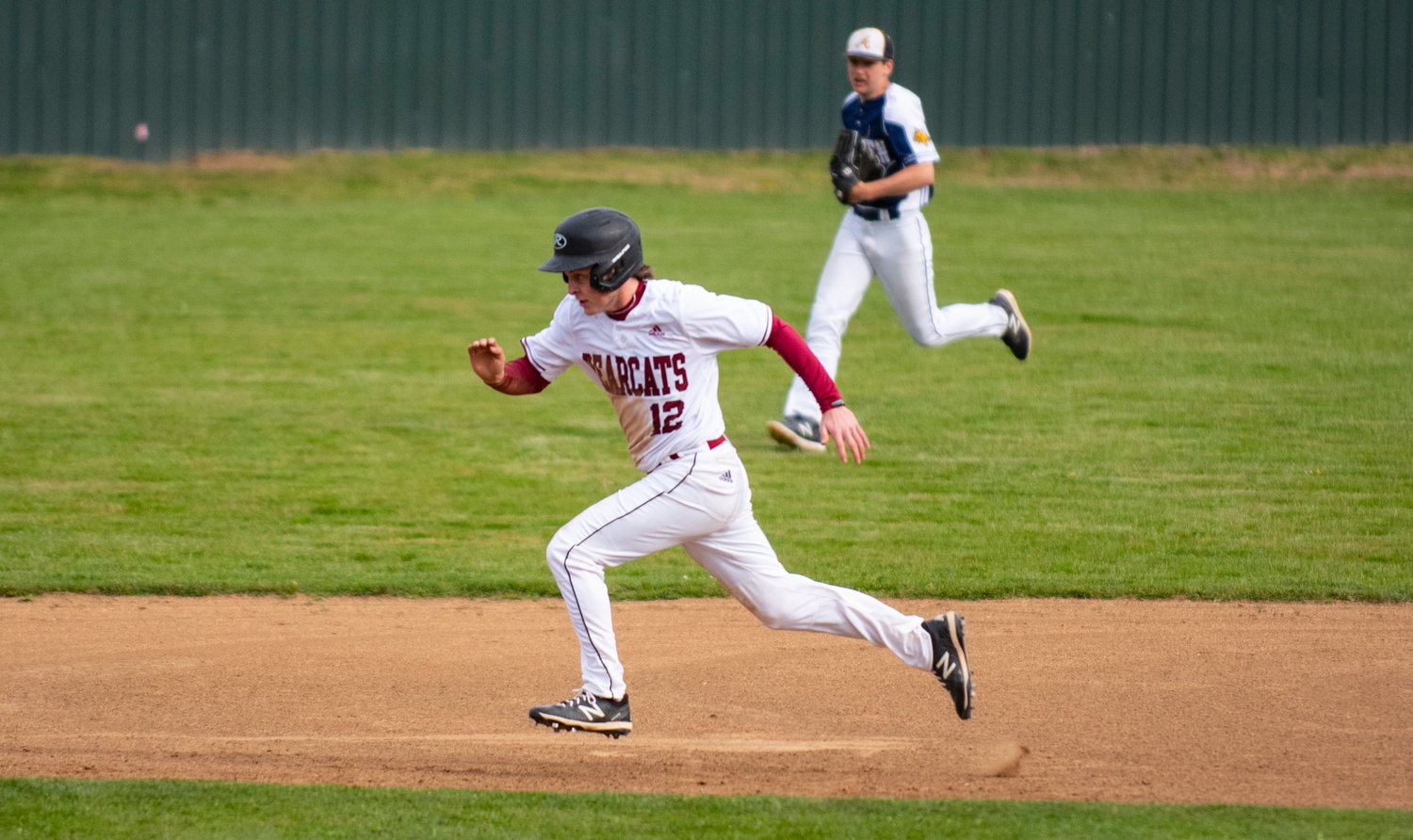 W.F. West pinch runner Jacob Douglass sprints to third base on Friday.