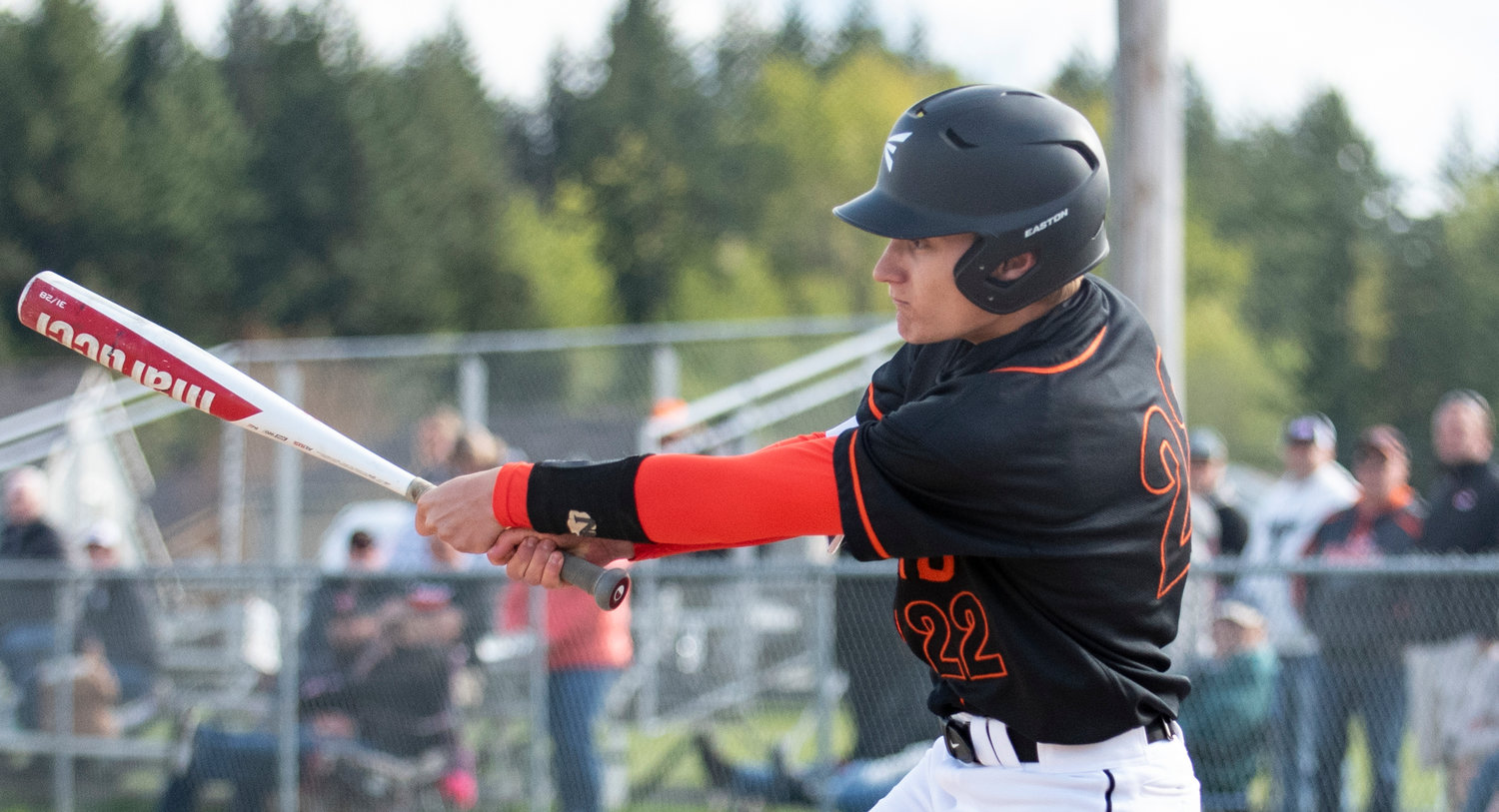 Napavine's Conner Holmes connects on an Onalaska pitch on Monday.
