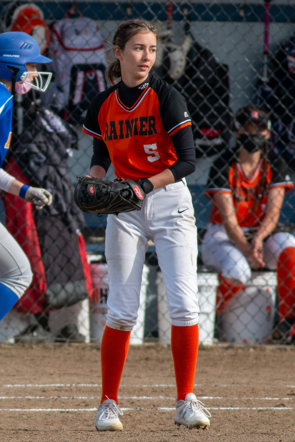 Rainier sophomore Alyssa Lofgren catches the ball at first base.
