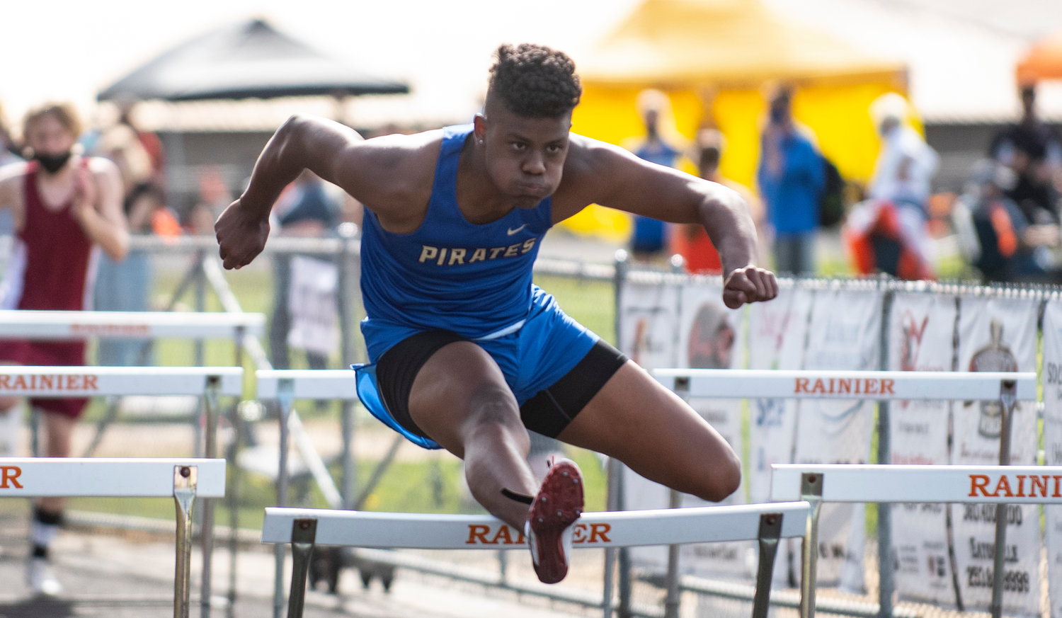 Adna senior Willis Ames wins the boys 110-meter hurdles at the district championships Thursday.