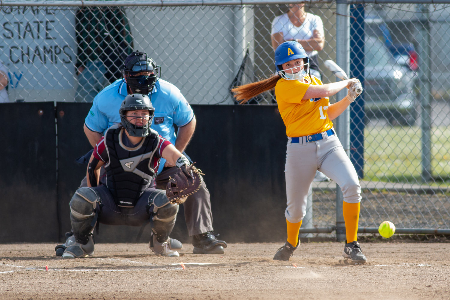 Adna's Natalie Loose smacks a base hit against Ocosta during the semifinal round of the district tournament Thursday at home.