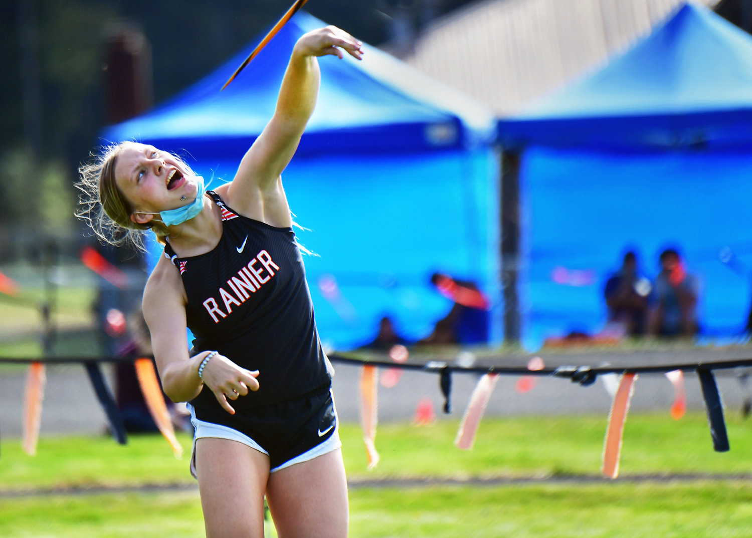 Rainier High School’s Kaeley Schultz unleashes the javelin on Thursday, April 29, during the WIAA District 4 Track & Field Championships at Rainier High School.