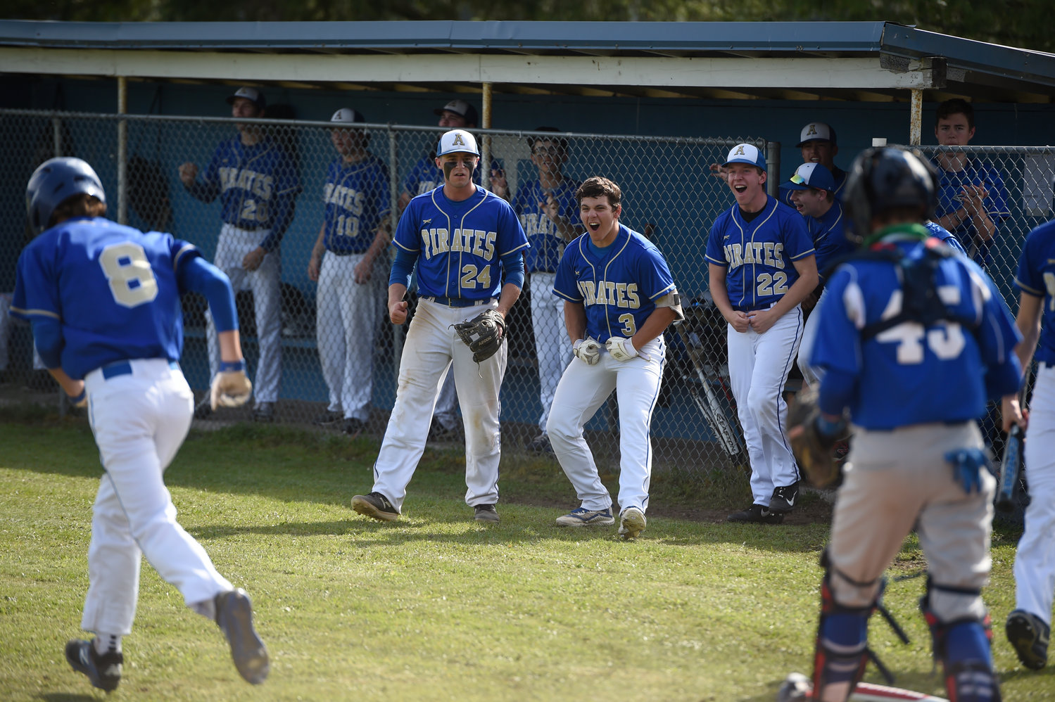 Adna players celebrate after scoring on Toutle Lake in the district semifinals on Thursday.