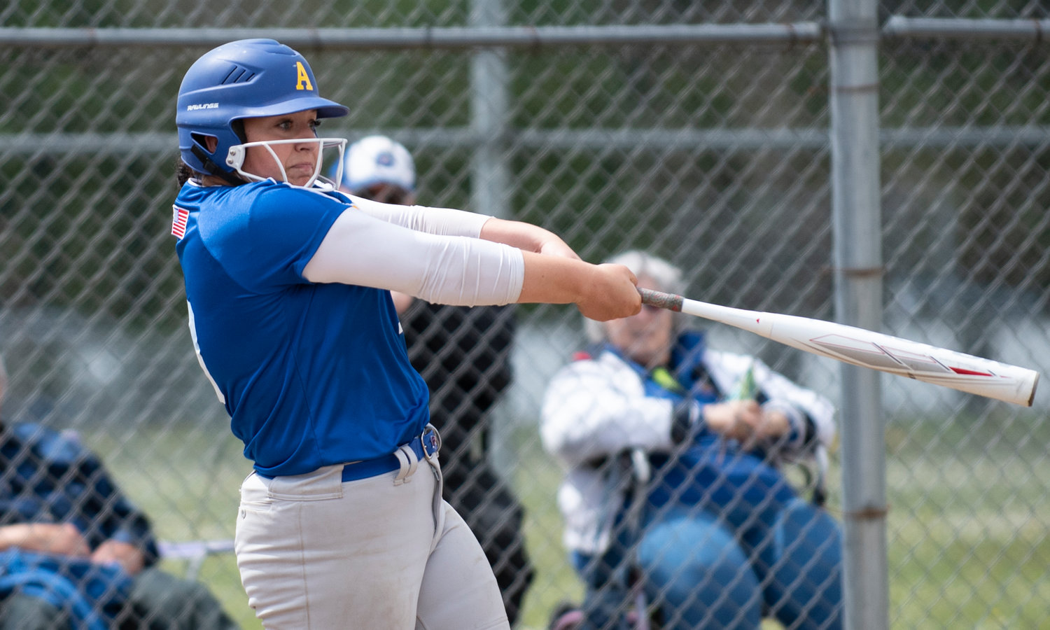 Adna's Kaylee Ashley smacks a double against Forks on Saturday.