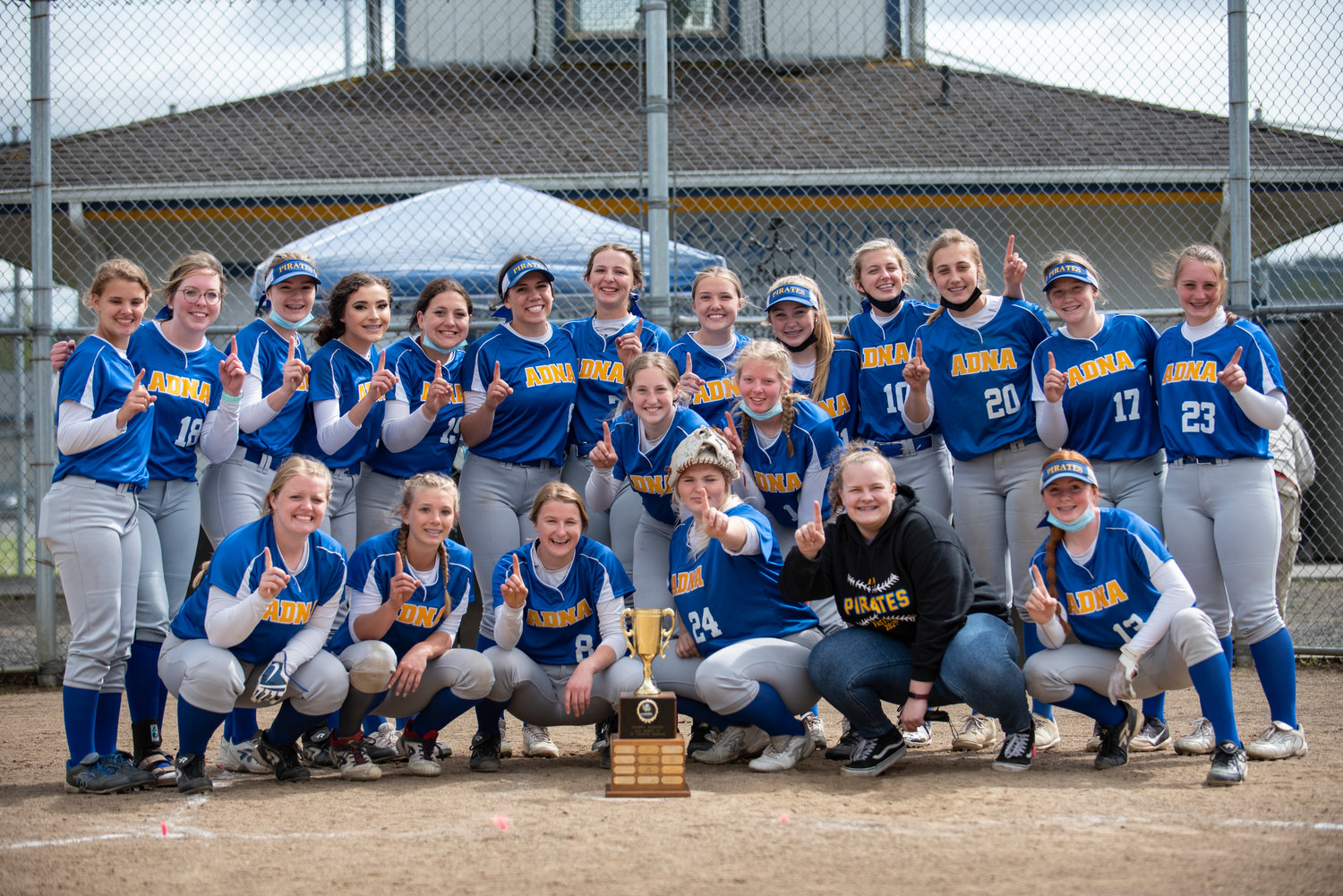 Adna softball poses with the district title trophy after defeating Forks, 4-3, in the championship game on Saturday, May 1, 2021.