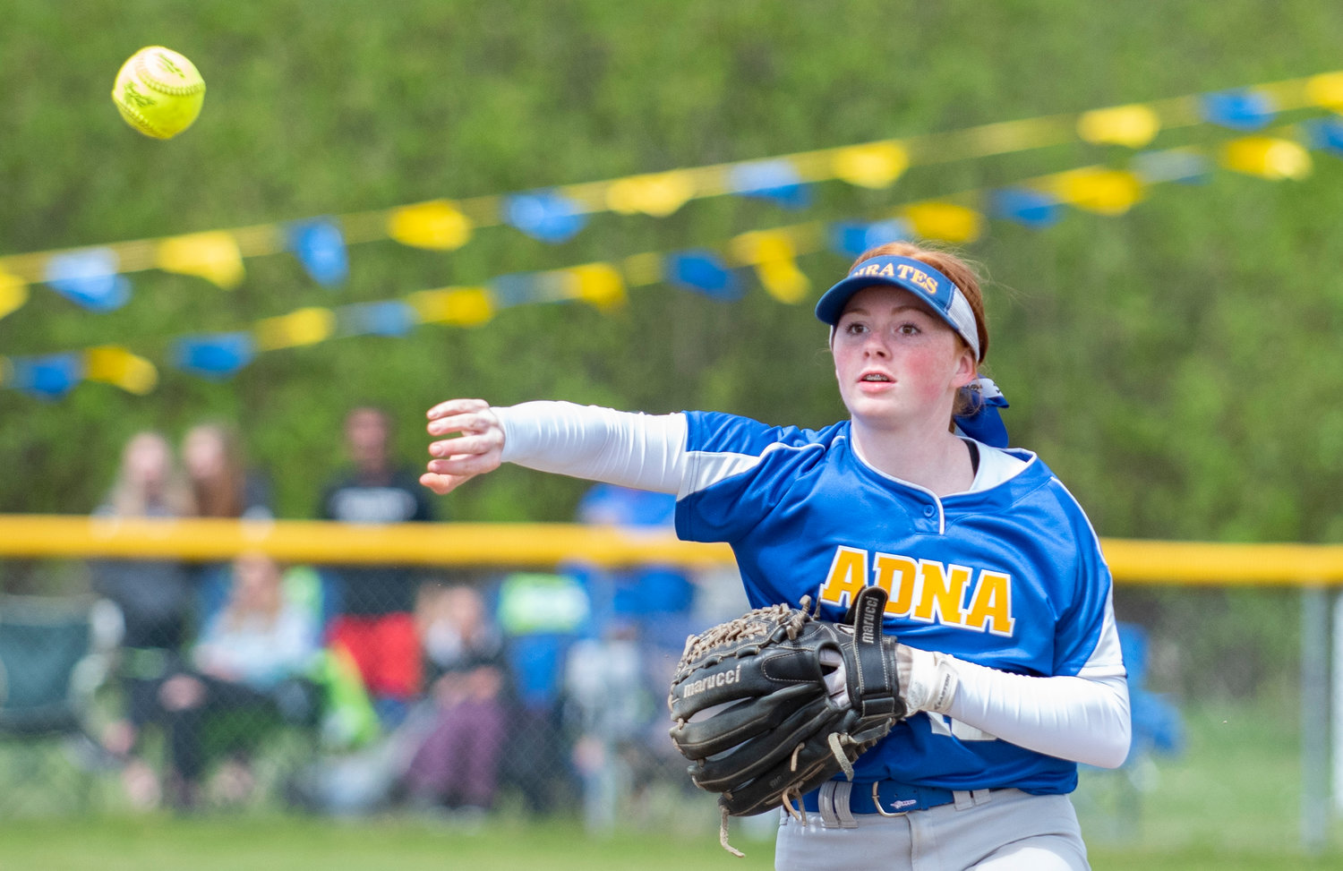 Adna second baseman Natalie Loose makes a throw to first base on Saturday.