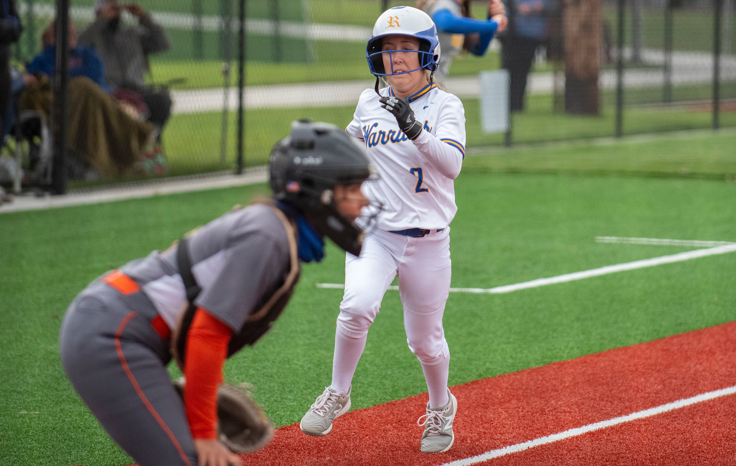 Rochester senior Faith Kennedy (2) scores a run against Ridgefield in the district semifinals on Thursday.