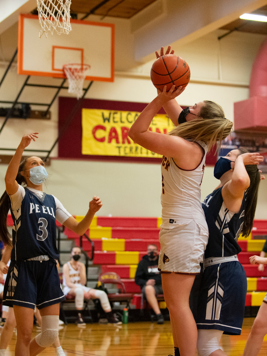 Winlock's Addison Hall shoots for two of her game-high 32 points against Pe Ell on Saturday.